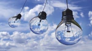dangling lightbulbs in clouds to signify new ideas