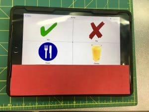 Image of iPad covered with clear acetate and a foamie boarder at the bottom
