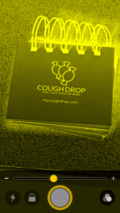 Image of iPhone magnifier with yellow black contrast