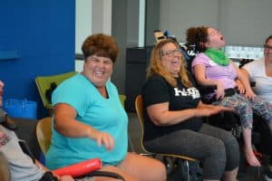 Image of ACES parents laughing together.